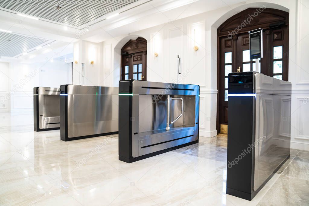 entrance and turnstile with face recognition and body temperature measurement.