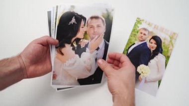 Gelin ve damadın kağıt resimlerine basılmış..