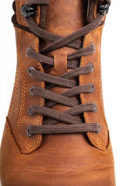 Top view. part of brown leather winter boots with lacing on a white background — Stock Photo, Image