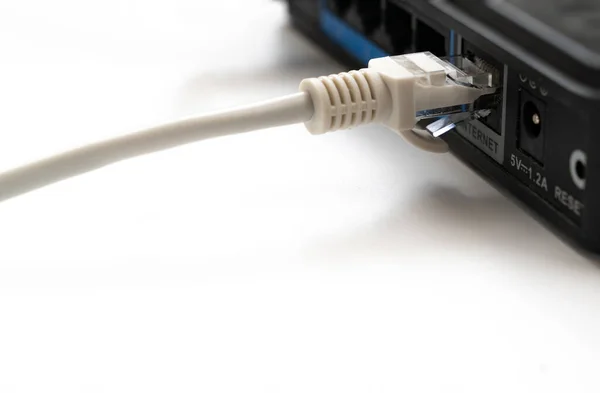 Patch cable, patch cord, connecting cord in the router — Fotografia de Stock