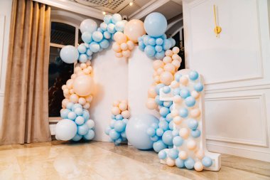 photo zone with balloons and the number one to celebrate the first birthday clipart