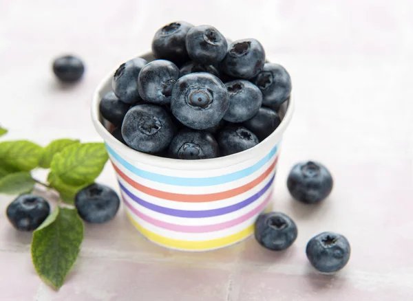 Freshly Picked Blueberries Pink Tile Background Concept Healthy Eating Stock Photo