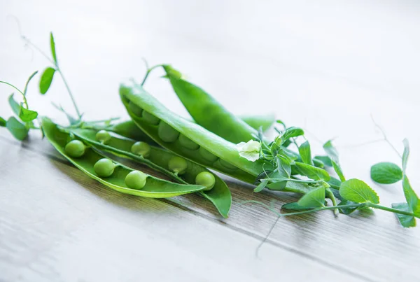 Green Peas Leaves Wooden Background — Stockfoto