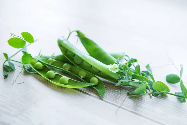 Green Peas Leaves Wooden Background — 图库照片