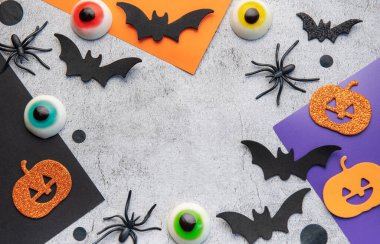 Halloween holiday background with  decorations. View from above. Flat lay