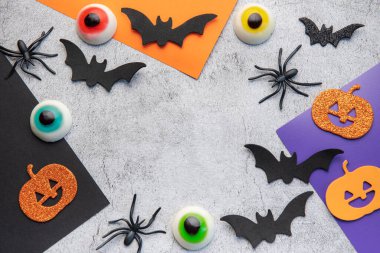 Halloween holiday background with  decorations. View from above. Flat lay