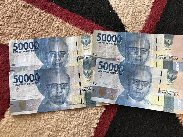 Indonéz Rúpia Háttérben Indonéz Rúpiás Bankjegysorozat Százezer Rúpiás Idr Értékben — Stock Fotó