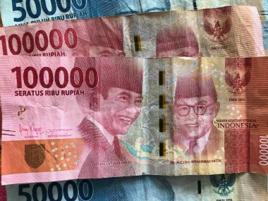 Geçmişi için Endonezya rupiası. Endonezya parası serisi 100.000 rupiah IDR 50.000 ve 100.000 rupi değerinde..