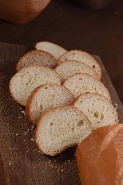 Chlebové Plátky Dřevěném Pozadí — Stock fotografie