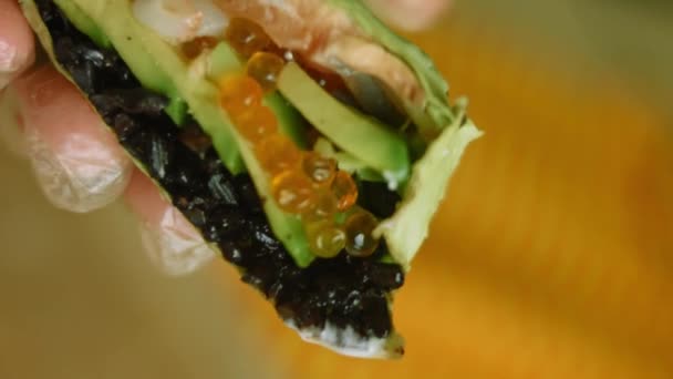 Combination of sushi and burritos. Litchi is also used for aftertaste — Stock Video