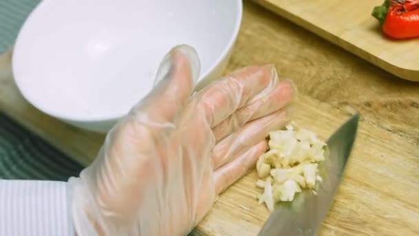 I put the crushed garlic in a bowl — Stock Video