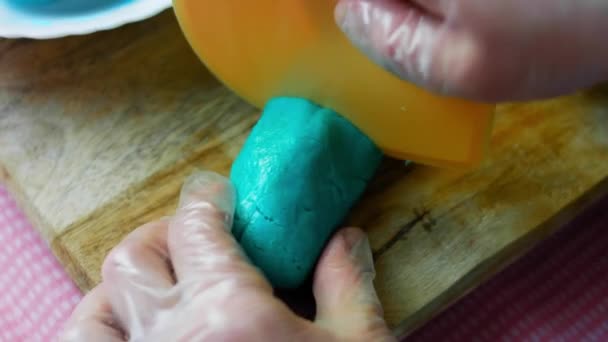 Divide the blue dough into several parts — Stock Video