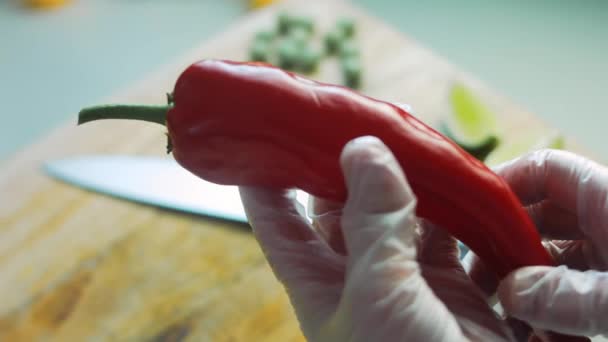 Cut a Sweet Red Kapia Peppers — Stock Video