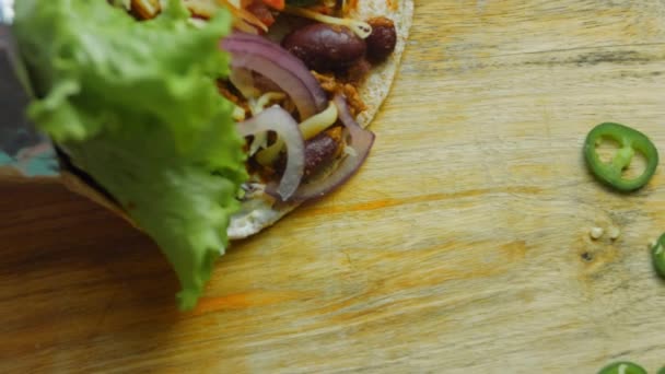 Very Large Burrito Avocado Chorizo Meat Filming Romantic Setting Macro — Stock Video