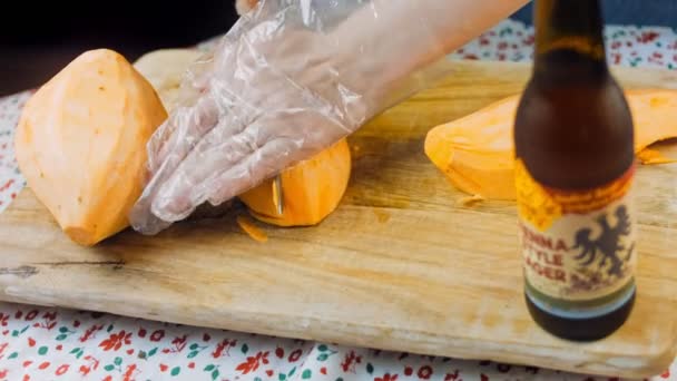 Chef Cuts Sweet Potatoes Slices Romantic Atmosphere Background — Stock Video