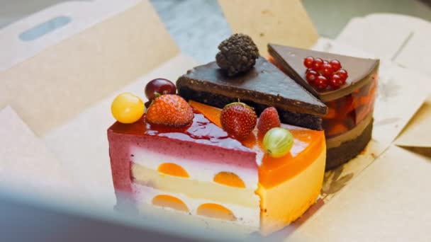 Few Slices White Red Strawberry Cherry Cake Chocolate Open Box — Vídeo de stock