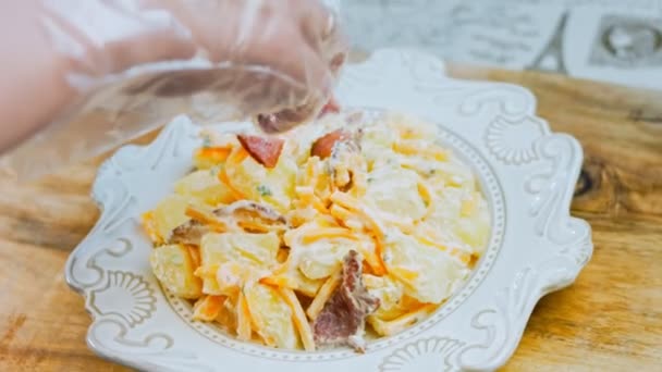 Woman Puts Fried Marinated Bacon Salad Jalapeno Pepper Potato Salad — Stock Video