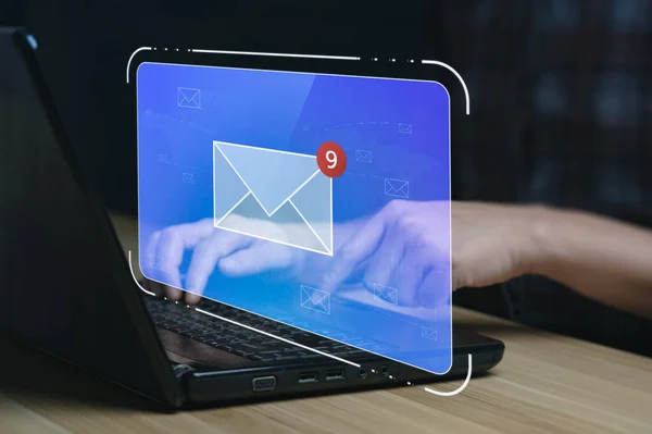 email marketing concept. Businessman using tablet surfing internet on desk with email icon, electronic mail, e-commerce. newsletter email and protect your personal information from spam mail concept