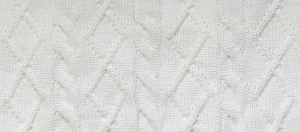 背景为冬季图案的白色羊毛衫的针织质地 — 图库照片