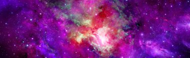 Outer space with a multicolored nebula and stars
