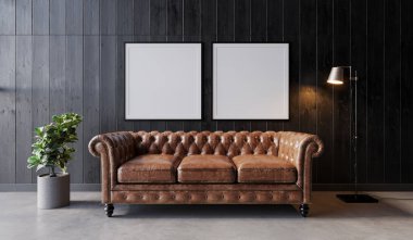 Oturma odasında, duvarında resim çerçevesi ve mobilya dekorasyonu var.