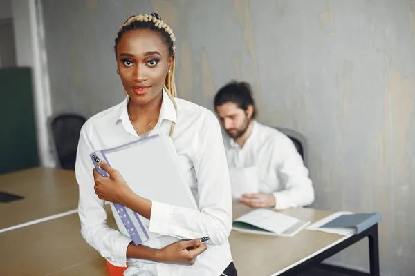 Mixed businesspeople working at the office — Fotografia de Stock