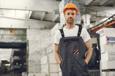 Engineer checking the products in the control room