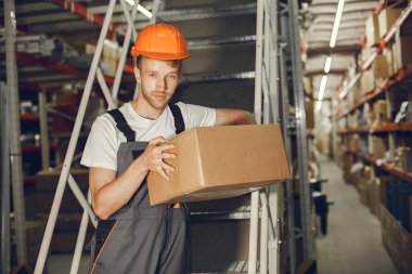 Engineer checking the products in the control room