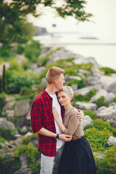 Happy couple in a park — Stock Photo, Image