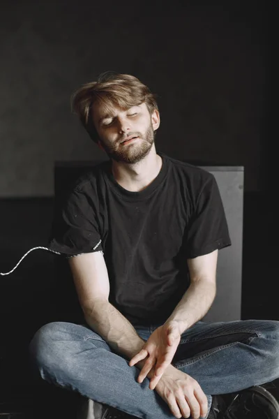 Male druggy sitting relaxed after taking dose — Foto de Stock