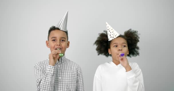 Black kids celebrating birthday over white background — Video