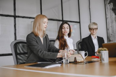 Colleagues hold a meeting in the office.