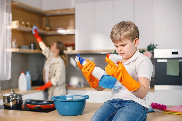 Blonde Boy Adult Woman Cleaning Kitchen Wearing Orange Gloves Caucasian — Stock Photo, Image