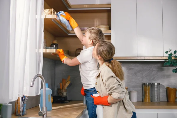 Blonde Boy Adult Woman Cleaning Kitchen Wearing Orange Gloves Caucasian — Stock Photo, Image