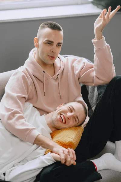 Young Romantic Gay Couple Spending Day Cuddling Relaxing Couch Different — Stock Photo, Image