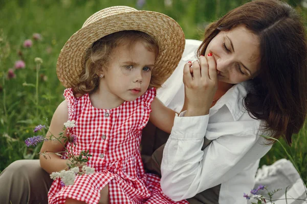 Family in a summer field. Sensual photo. Cute little girl.