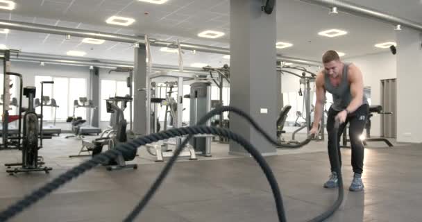 Athletic Guy Focuses Fitness Training Ropes Gym Functional Mens Training — стоковое видео