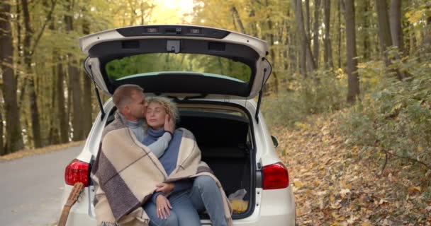 Couple Love Jeans Hiding Blanket Sitting Trunk Car Autumn Date — Video