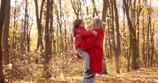 Young Mother Red Jacket Holds Her Daughter Her Arms Soak — Stockvideo