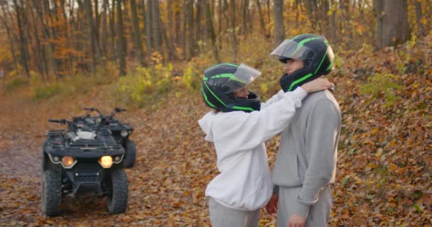 Young Couple Wears Protective Helmets Heads Atvs Active Rest Autumn — Vídeo de Stock