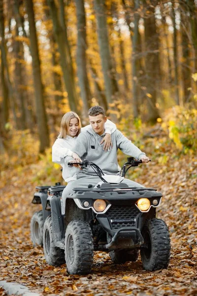 Young Caucasian Man Woman Riding Atv Quad Bike Autumn Forest — Zdjęcie stockowe