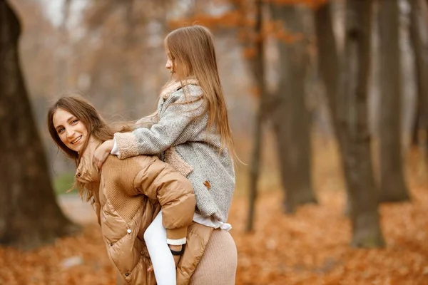 Young Woman Little Girl Autumn Forest Woman Carry Her Daughter — Fotografia de Stock