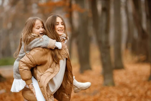 Young Woman Little Girl Autumn Forest Woman Carry Her Daughter — Fotografia de Stock