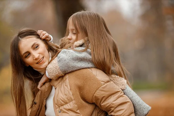 Young Woman Little Girl Autumn Forest Woman Carry Her Daughter —  Fotos de Stock