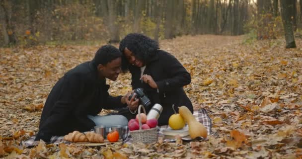 Autumn Season Young Black People Romantic Date Hugging Reading Book — Stockvideo