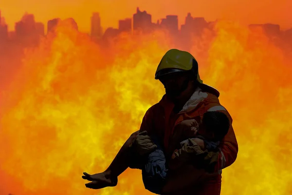 Silhouette Firefighter Holding Child Help Him Fire Smoke Firefighter Saves — Stock Photo, Image
