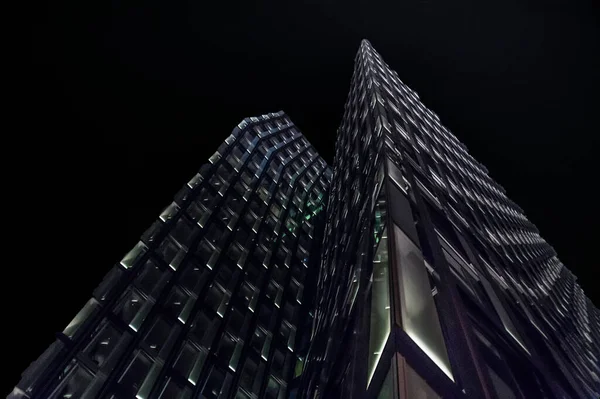 germany night photo district district reeperbahn skyscrapers tilted tower design architecture landscape monochrome lighting black metropolis line dark symmetry night skyscraper light