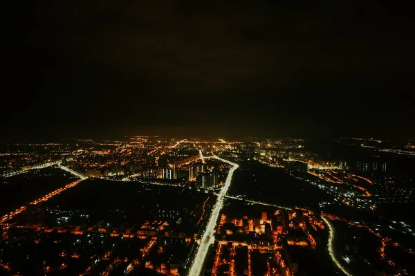 night glowing city, drone view