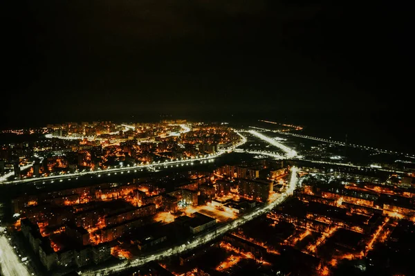 night glowing city, drone view