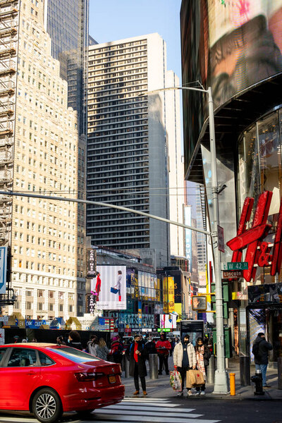 New York City, USA - December 22, 2021: Daily Life during Covid-19 pandemic in New York City. People on the streets during COVID-19 pandemic Omicron wave.   